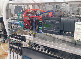 prototype of a liquid dispensing machine engineered by Tandem Technologies, LLC